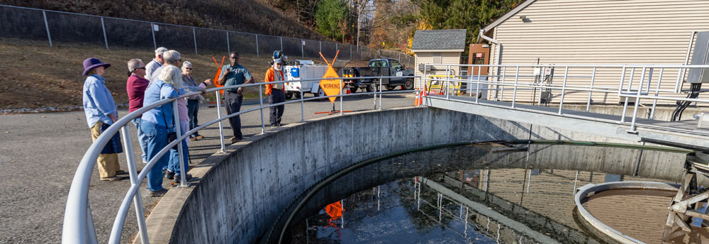 Guests tour the Heritage Village Wastewater Facility during an open house