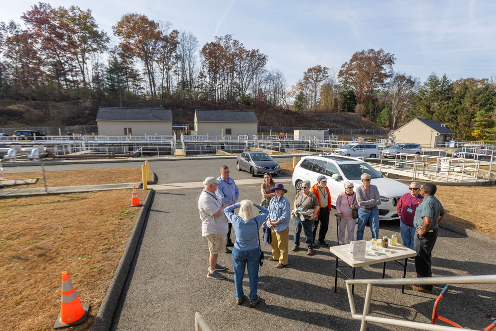 Guests tour the Heritage Village Wastewater Facility during an open house